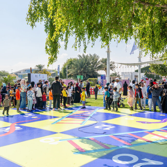 outdoor life-sized snake and ladder game